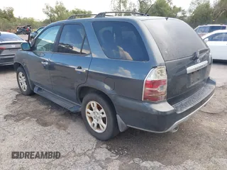 2004 Acura MDX Touring Pkg w/Navigation with VIN 2HNYD18894H547061, listed as a IAAI auction lot 41743094 with 255,902 mi miles. Bid and sale history available at carsss.com. Image 3.