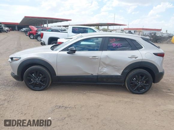 2024 Mazda CX-30 S Select Sport with VIN 3MVDMBBM3RM657918, listed as a IAAI auction lot 42218316 with 27,595 mi miles and . Bid and sale history available at carsss.com. Image 14.