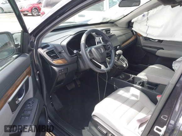 2019 Honda CR-V EX with VIN 2HKRW1H52KH513252, listed as a IAAI auction lot 42074091 with 31,764 mi miles and . Bid and sale history available at DreamBid. Image 5.