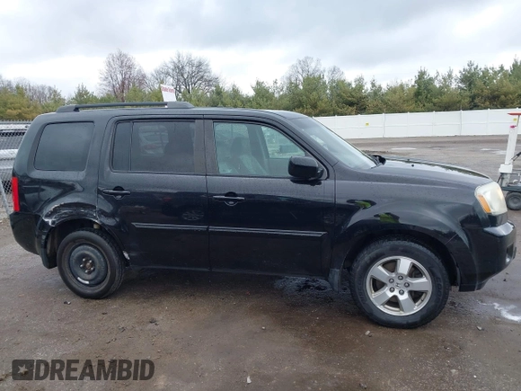 2011 Honda Pilot EX-L with VIN 5FNYF4H51BB080874, listed as a IAAI auction lot 42034400 with 194,080 mi miles and . Bid and sale history available at carsss.com. Image 13.
