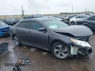2014 Toyota Camry L with VIN 4T4BF1FK9ER443450, listed as a IAAI auction lot 41889283 with 205,020 mi miles. Bid and sale history available at carsss.com. Image 1.