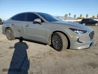 2021 Hyundai Sonata Hybrid SEL with VIN KMHL34JJ6MA032448, listed as a Copart auction lot 48497345 with 57,520 mi miles and Salvage Title. Bid and sale history available at carsss.com. Image 4.