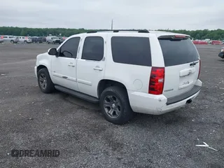 2007 Chevrolet Tahoe LTZ with VIN 1GNFK13007J149042, listed as a IAAI auction lot 42593189 with 216,791 mi miles and . Bid and sale history available at DreamBid. Image 3.