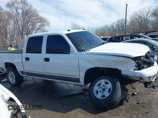 2005 Chevrolet Silverado 1500 LS with VIN 2GCEK13T151233103, listed as a IAAI auction lot 41656738 with 216,008 mi miles. Bid and sale history available at carsss.com. Image 14.
