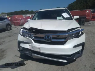 2019 Honda Pilot Touring 8-Passenger with VIN 5FNYF5H91KB038679, listed as a IAAI auction lot 40200012 with 70,582 mi miles. Bid and sale history available at carsss.com. Image 12.