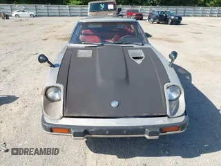 1983 Datsun 280ZX z VIN JN1HZ04S9DX573578, wystawiony jako IAAI lot #42516151 z przebiegiem 135 572 mil mil oraz . Historia ofert i sprzedaży dostępna na DreamBid. Obrazek 6.