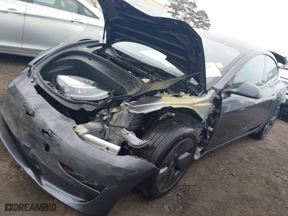 2023 Tesla Model 3 with VIN 5YJ3E1EA7PF642913, listed as a IAAI auction lot 41898249 with 26,394 mi miles. Bid and sale history available at carsss.com. Image 20.