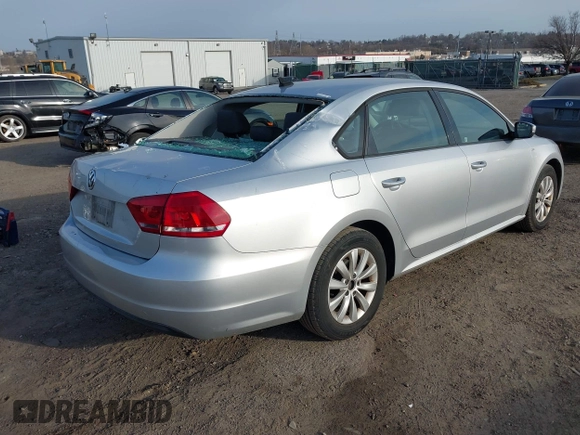 2014 Volkswagen Passat S w/Nav with VIN 1VWAP7A39EC016279, listed as a IAAI auction lot 41792113 with 189,833 mi miles. Bid and sale history available at carsss.com. Image 4.