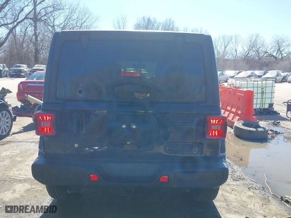 2018 Jeep Wrangler Unlimited Sahara with VIN 1C4HJXEG6JW108376, listed as a IAAI auction lot 41674757 with 69,649 mi miles. Bid and sale history available at carsss.com. Image 17.
