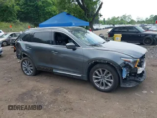 2020 Mazda CX-9 Grand Touring with VIN JM3TCBDY4L0408920, listed as a IAAI auction lot 42325272 with 45,837 mi miles and . Bid and sale history available at DreamBid. Image 13.