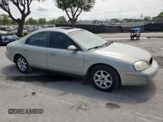 2003 Mercury Sable LS Premium с VIN 1MEFM55S23A617225, выставлен на аукционе Copart как лот 52021765 с пробегом 131 291 миль миль и Списание • Salvage title. История ставок и продаж доступна на DreamBid. Изображение 4.