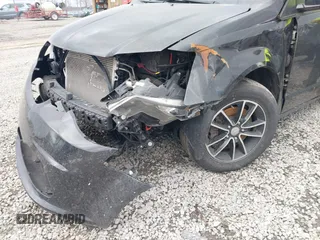 2018 Dodge Grand Caravan SXT with VIN 2C4RDGCG5JR156118, listed as a IAAI auction lot 41784516 with 113,474 mi miles and . Bid and sale history available at DreamBid. Image 6.