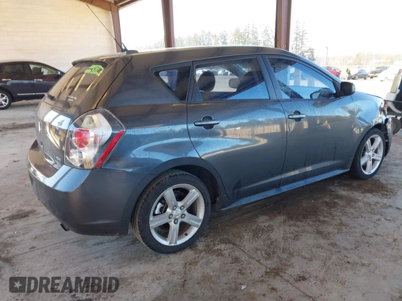 2010 Pontiac Vibe w/1SB with VIN 5Y2SP6E02AZ402311, listed as a IAAI auction lot 41446004 with 150,049 mi miles. Bid and sale history available at carsss.com. Image 4.
