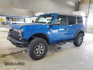 2024 Ford Bronco Badlands z VIN 1FMEE9BP5RLA08124, wystawiony jako Copart lot #52100065 z przebiegiem 6300 mil mil oraz Szkody całkowita. Historia ofert i sprzedaży dostępna na DreamBid. Obrazek 1.