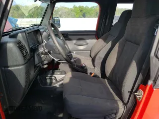 2004 Jeep Wrangler X with VIN 1J4FA39S94P709062, listed as a Copart auction lot 45573034 with 203,502 mi miles and Salvage Title. Bid and sale history available at carsss.com. Image 7.