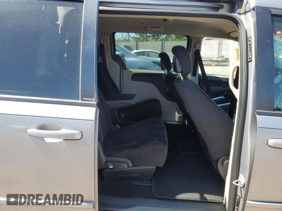 2013 Dodge Grand Caravan SXT with VIN 2C4RDGCG0DR582254, listed as a Copart auction lot 54735205 with 126,071 mi miles and Salvage Title. Bid and sale history available at DreamBid. Image 11.