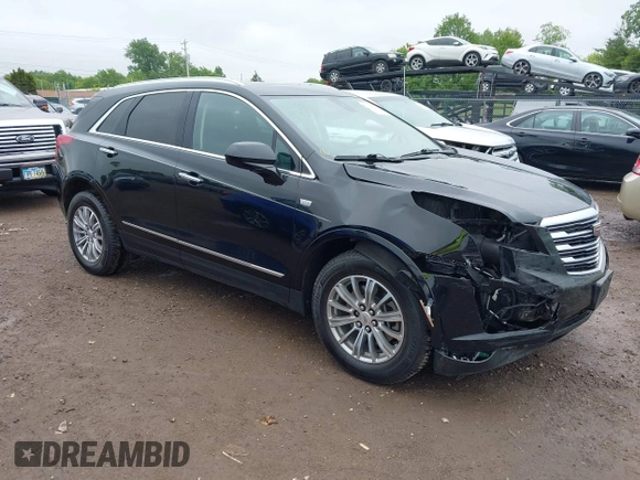 2017 Cadillac XT5 Luxury AWD with VIN 1GYKNDRS9HZ149675, listed as a IAAI auction lot 42329454 with 77,257 mi miles and . Bid and sale history available at DreamBid. Image 1.