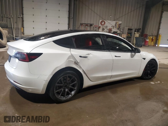 2021 Tesla Model 3 Standard Range Plus with VIN 5YJ3E1EA5MF987000, listed as a Copart auction lot 87638485 with Not Provided miles and Salvage Title. Bid and sale history available at DreamBid. Image 3.