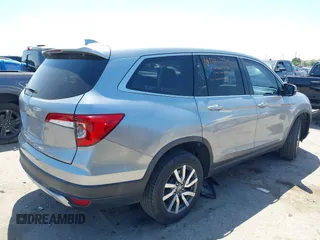 2019 Honda Pilot EX-L with VIN 5FNYF5H58KB040331, listed as a IAAI auction lot 41977727 with 90,655 mi miles and . Bid and sale history available at DreamBid. Image 4.