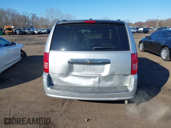 2010 Chrysler Town & Country Touring with VIN 2A4RR5D14AR359169, listed as a IAAI auction lot 41900856 with 204,595 mi miles and . Bid and sale history available at DreamBid. Image 16.