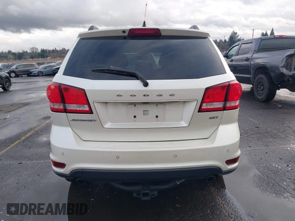 2014 Dodge Journey SXT with VIN 3C4PDCBGXET182430, listed as a IAAI auction lot 41599489 with 143,889 mi miles. Bid and sale history available at carsss.com. Image 16.