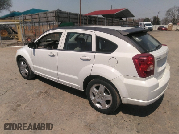 2009 Dodge Caliber SXT with VIN 1B3HB48A19D259105, listed as a IAAI auction lot 41881974 with 127,096 mi miles and . Bid and sale history available at DreamBid. Image 3.