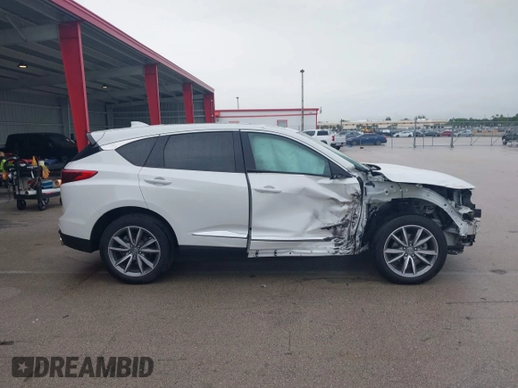 2021 Acura RDX Technology z VIN 5J8TC1H56ML011567, wystawiony jako IAAI lot #40138965 z przebiegiem 22 938 mil mil oraz . Historia ofert i sprzedaży dostępna na DreamBid. Obrazek 14.