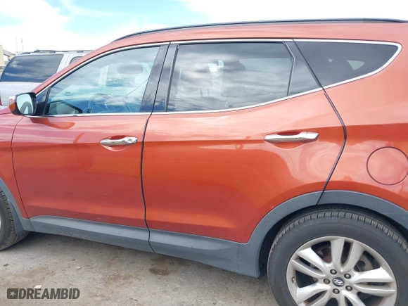 2013 Hyundai Santa Fe 2.0T Sport with VIN 5XYZUDLA3DG123041, listed as a IAAI auction lot 42004611 with 141,484 mi miles. Bid and sale history available at carsss.com. Image 14.