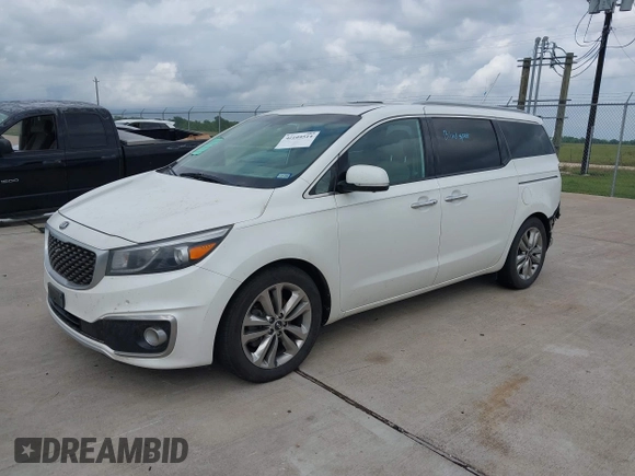 2015 Kia Sedona SX-L with VIN KNDME5C12F6028893, listed as a IAAI auction lot 42109514 with 169,303 mi miles and . Bid and sale history available at DreamBid. Image 2.