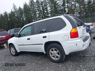2009 GMC Envoy SLE with VIN 1GKDS33S892108589, listed as a IAAI auction lot 41883738 with 172,027 mi miles. Bid and sale history available at carsss.com. Image 14.