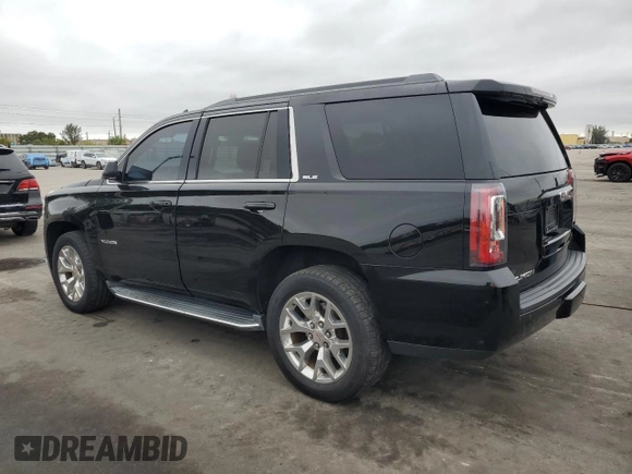 2015 GMC Yukon SLE with VIN 1GKS1AKC0FR684558, listed as a Copart auction lot 42162985 with 156,302 mi miles and Clean Title. Bid and sale history available at carsss.com. Image 2.
