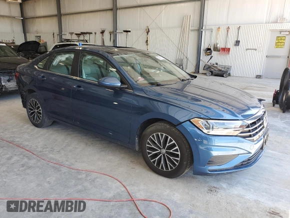 2019 Volkswagen Jetta S z VIN 3VWC57BU4KM209973, wystawiony jako Copart lot #62281525 z przebiegiem 46 927 mil mil oraz Czysty tytuł • Clean title. Historia ofert i sprzedaży dostępna na DreamBid. Obrazek 4.