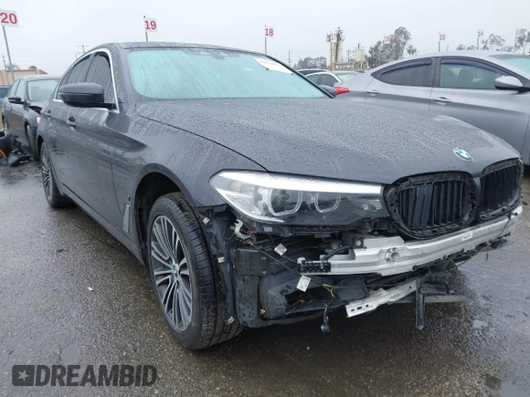 2019 BMW 5 Series 530e iPerformance with VIN WBAJA9C53KB399794, listed as a IAAI auction lot 41561874 with Not Provided miles. Bid and sale history available at carsss.com. Image 1.