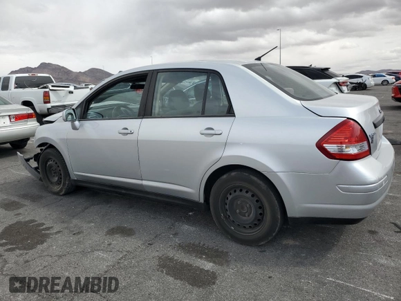 2011 Nissan Versa S with VIN 3N1BC1AP6BL471113, listed as a Copart auction lot 51660455 with 94,641 mi miles and Salvage title. Bid and sale history available at DreamBid. Image 2.