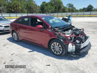 2022 Toyota Corolla LE with VIN JTDVPMAE4NJ221959, listed as a Copart auction lot 52168765 with 40,324 mi miles and Salvage Title. Bid and sale history available at DreamBid. Image 4.