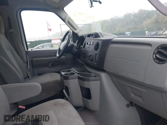 2012 Ford Econoline Cargo Recreational with VIN 1FTNE2EW8CDA64042, listed as a IAAI auction lot 42197470 with 130,647 mi miles. Bid and sale history available at carsss.com. Image 5.