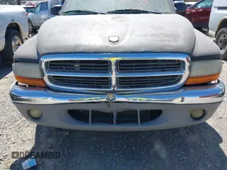 1998 Dodge Dakota SLT z VIN 1B7FL26X5WS635679, wystawiony jako IAAI lot #41688137 z przebiegiem 269 908 mil mil oraz . Historia ofert i sprzedaży dostępna na DreamBid. Obrazek 6.