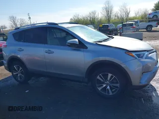 2018 Toyota RAV4 XLE with VIN JTMWFREV3JD120189, listed as a IAAI auction lot 41976999 with 62,182 mi miles and . Bid and sale history available at carsss.com. Image 14.