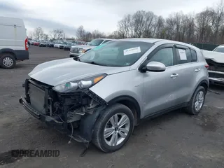 2018 Kia Sportage LX with VIN KNDPMCAC4J7437926, listed as a IAAI auction lot 41968696 with 139,304 mi miles. Bid and sale history available at carsss.com. Image 2.