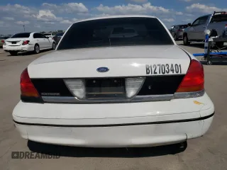 1999 Ford Crown Victoria Police with VIN 2FAFP71WXXX198735, listed as a Copart auction lot 70526134 with 116,889 mi miles and Clean Title. Bid and sale history available at carsss.com. Image 6.