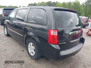 2010 Dodge Grand Caravan SXT with VIN 2D4RN5D11AR154526, listed as a IAAI auction lot 42009099 with 239,343 mi miles and . Bid and sale history available at DreamBid. Image 3.