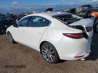 2020 Mazda 3 Premium with VIN 3MZBPAEM3LM132772, listed as a IAAI auction lot 42067269 with 53,751 mi miles and . Bid and sale history available at DreamBid. Image 3.