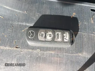2018 Mazda 3 Sport z VIN 3MZBN1U76JM172939, wystawiony jako IAAI lot #42189372 z przebiegiem Nie podano mil oraz . Historia ofert i sprzedaży dostępna na DreamBid. Obrazek 11.