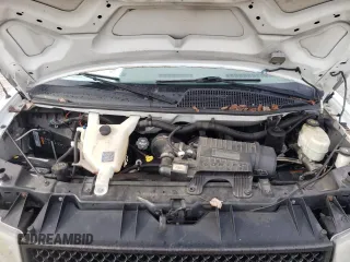 2014 Chevrolet Express Passenger LT with VIN 1GAZG1FG2E1202457, listed as a Copart auction lot 82704884 with 142,982 mi miles and Salvage title. Bid and sale history available at DreamBid. Image 12.