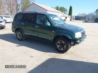 2002 Suzuki XL-7 Standard with VIN JS3TX92V124124409, listed as a IAAI auction lot 42166017 with 194,418 mi miles. Bid and sale history available at carsss.com. Image 1.