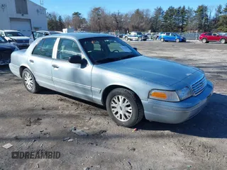 2004 Ford Crown Victoria LX z VIN 2FAFP74W84X147774, wystawiony jako IAAI lot #41431695 z przebiegiem 172 037 mil mil oraz . Historia ofert i sprzedaży dostępna na DreamBid. Obrazek 1.