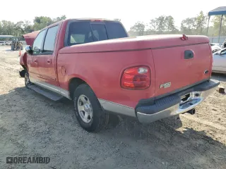 2001 Ford F-150 SuperCrew XLT with VIN 1FTRW07W61KD79835, listed as a Copart auction lot 69102274 with 0 mi miles and Salvage Title. Bid and sale history available at carsss.com. Image 2.
