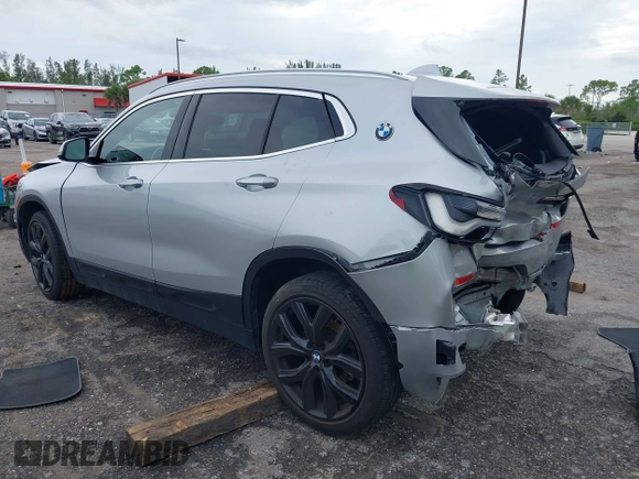 2022 BMW X2 sDrive28i z VIN WBXYH9C09N5T71828, wystawiony jako IAAI lot #40536245 z przebiegiem 36 012 mil mil oraz . Historia ofert i sprzedaży dostępna na DreamBid. Obrazek 3.