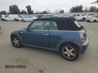2010 MINI Convertible with VIN WMWMR3C52ATU98506, listed as a Copart auction lot 47706195 with 92,804 mi miles and Clean Title. Bid and sale history available at DreamBid. Image 2.