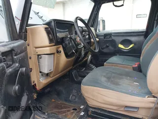 1997 Jeep Wrangler SE with VIN 1J4FY29P7VP478097, listed as a IAAI auction lot 41900741 with Not Provided miles and . Bid and sale history available at DreamBid. Image 5.